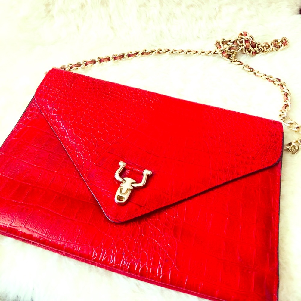 Red gator print shoulder bag